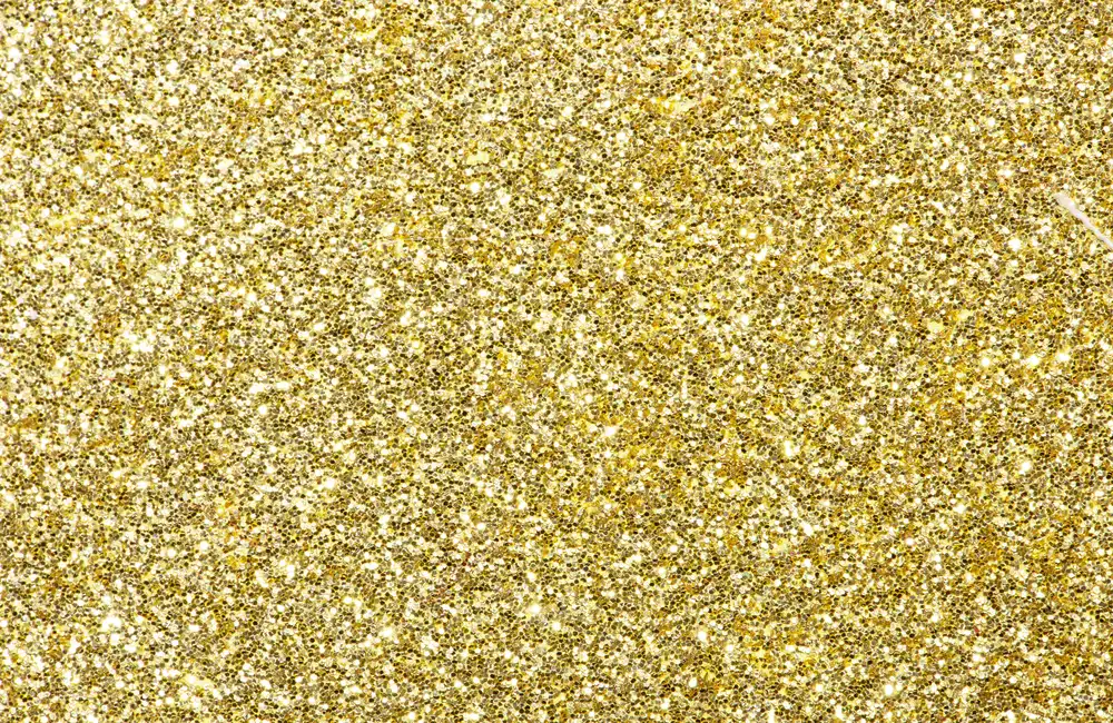 Gold Glitters Amid Trade Turmoil: Record Highs Sparked by U.S.-China Tensions and Dollar Weakness